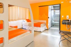 Llit o llits en una habitació de Concept Design Hostel & Suites