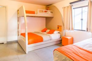 Llit o llits en una habitació de Concept Design Hostel & Suites