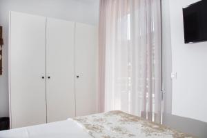 Postel nebo postele na pokoji v ubytování Elenis Philoxenia