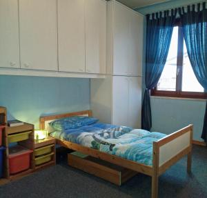 A bed or beds in a room at Le Magnolie B&B