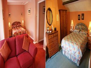 een slaapkamer met een bank, een bed en een spiegel bij The Blacksmiths Arms in Brampton