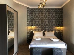 A bed or beds in a room at Paradise Kazbegi