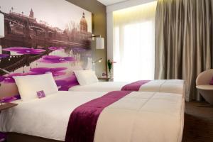 Кровать или кровати в номере Mercure Toulouse Centre Wilson Capitole +21 фотография