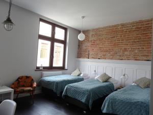Posteľ alebo postele v izbe v ubytovaní Good Time Aparthotel