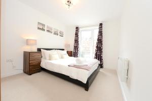 Voodi või voodid majutusasutuse New Central - Woking toas