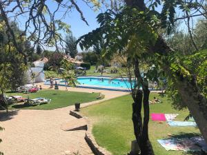 The swimming pool at or close to Apartamento 157, Pedras d’el Rei