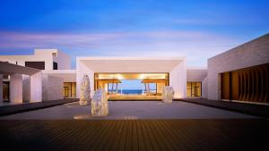a building with a view of the ocean at Nobu Hotel Los Cabos in Cabo San Lucas