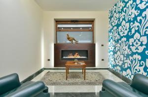 A seating area at Best Western Hotel Ferrari