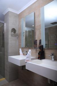 Koupelna v ubytování Mado Hotel