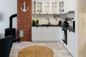 Kuchyňa alebo kuchynka v ubytovaní Apartament Heaven Bay