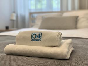 Posteľ alebo postele v izbe v ubytovaní Apartamenty Grobla III Q4Apartments