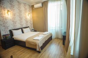 Katil atau katil-katil dalam bilik di Hotel Almi