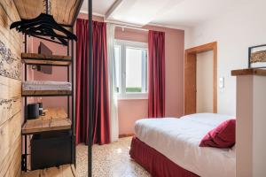 Postel nebo postele na pokoji v ubytování Sea Tower Torre Telemetrica Lido di Venezia