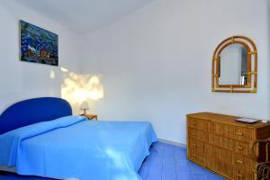 Llit o llits en una habitació de Aglaia Luxury Seaview Villa