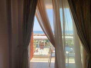 Ban công/sân hiên tại Fishta Hotel & Apartments