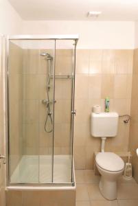 Kúpeľňa v ubytovaní Hungaria Apartments + 37 fotografií
