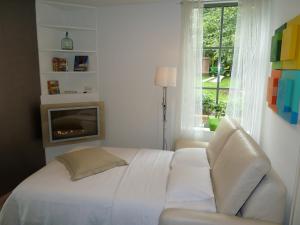 Voodi või voodid majutusasutuse B&B Zinnen en Minnen toas