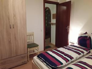 Łóżko lub łóżka w pokoju w obiekcie Ferienhaus Bionda