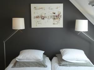 Voodi või voodid majutusasutuse B&B Zinnen en Minnen toas