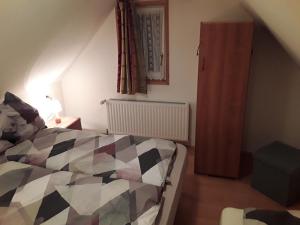 Łóżko lub łóżka w pokoju w obiekcie Ferienhaus Bionda
