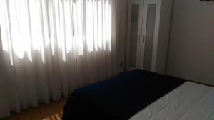 Łóżko lub łóżka w pokoju w obiekcie Apartamento marinero
