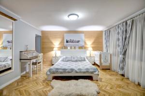 Posteľ alebo postele v izbe v ubytovaní Apartamenty Pod Baranami