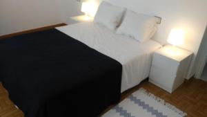Łóżko lub łóżka w pokoju w obiekcie Apartamento marinero