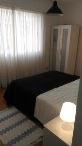 Łóżko lub łóżka w pokoju w obiekcie Apartamento marinero