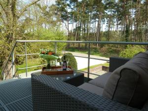 Rõdu või terrass majutusasutuses B&B Zinnen en Minnen