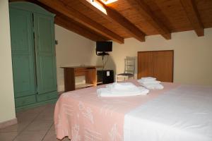 Voodi või voodid majutusasutuse Albergo Perseo toas