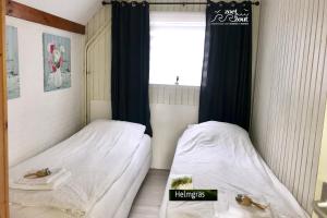 Giường trong phòng chung tại Holiday-Home HELMGRAS 5p. Amsterdam and the beach