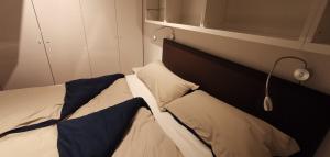 A bed or beds in a room at Downtown Vienna new built luxury suites