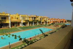 an overhead view of a swimming pool in a resort at Tavira Dream Holidays in Tavira