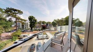 Ein Balkon oder eine Terrasse in der Unterkunft White Pearl Apartment 3.12