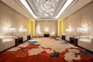 Foto sihtkohas Xinzheng asuva majutusasutuse Ramada Wyndham Zhengzhou Xinzheng galeriist +16 fotot