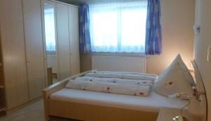 Cama o camas de una habitación en Haus Schennach