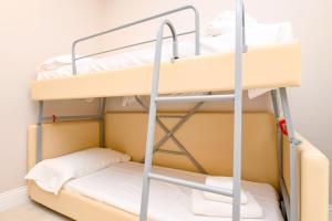 Posteľ alebo postele v izbe v ubytovaní Hotel Oliveto