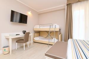 Posteľ alebo postele v izbe v ubytovaní Hotel Oliveto