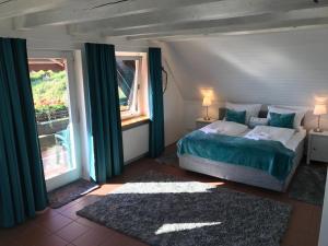 Voodi või voodid majutusasutuse Hotel-Berggasthof Schwarzwaldperle toas
