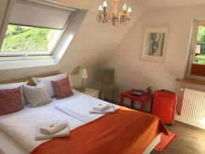 Voodi või voodid majutusasutuse Hotel-Berggasthof Schwarzwaldperle toas