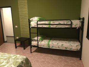 Posteľ alebo postele v izbe v ubytovaní Villa Vacanze Giuseppe