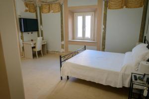 Voodi või voodid majutusasutuse B&B Civico69 toas