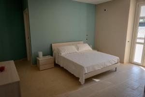Voodi või voodid majutusasutuse B&B Civico69 toas