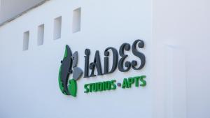 a sign for a school with the words class schools antidepressives at Iades Studios & Apartments in Agia Anna Naxos