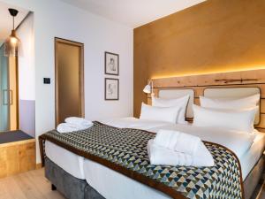 Postel nebo postele na pokoji v ubytování Walhalla Hotel Regensburg Hoeferer 4 Sterne Superior