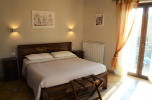 A bed or beds in a room at Il Castello