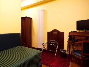 TV a/nebo společenská místnost v ubytování Relax Style House Central Rooms