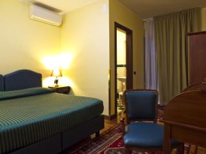 Postel nebo postele na pokoji v ubytování Relax Style House Central Rooms