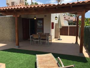 Patio nebo venkovní prostory v ubytování Sonora Aircon Bungalow 90