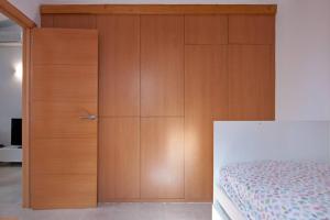 Postel nebo postele na pokoji v ubytování Sonora Aircon Bungalow 90